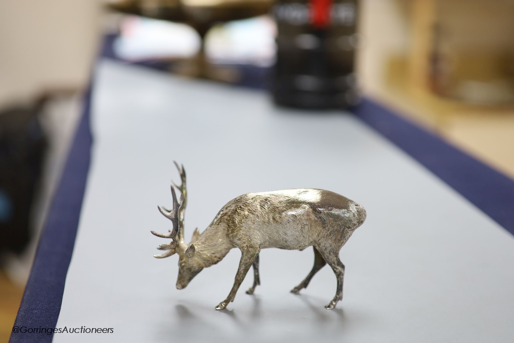 A modern free standing silver miniature model of a stag, C.F.H & Co, London, 1993, height 75mm, 195 grams.